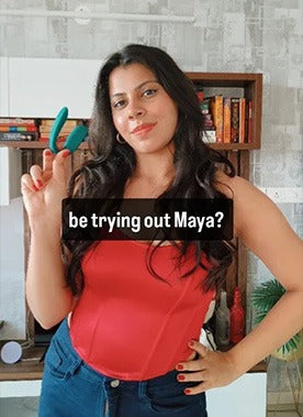 Women Holding Calmras Maya Personal Body Massager